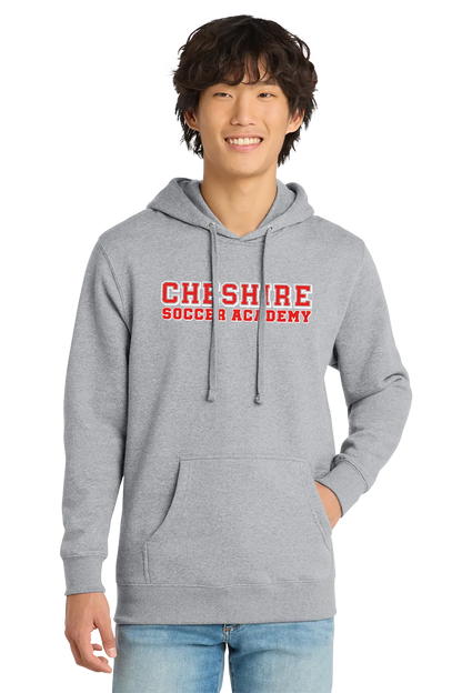 Person wearing a gray hoodie with 'Cheshire Soccer Academy' text on a white background. Paper Street Print Co, Blairstown, NJ.