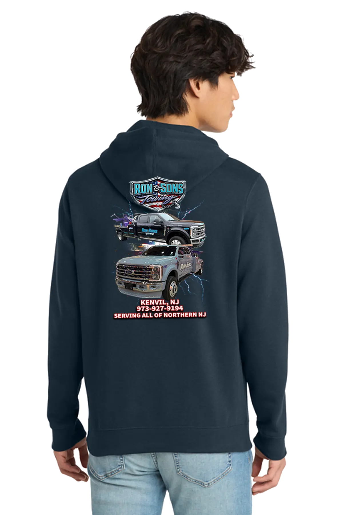 Person wearing a navy hoodie with graphics on the back, standing against a white background. Ron and Sons Towing, Paper Street Print Co, Blairstown, NJ.