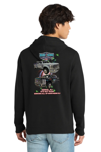 Person wearing a black hoodie with graphics on the back, standing against a white background. Ron and Sons Towing, Paper Street Print Co, Blairstown, NJ.