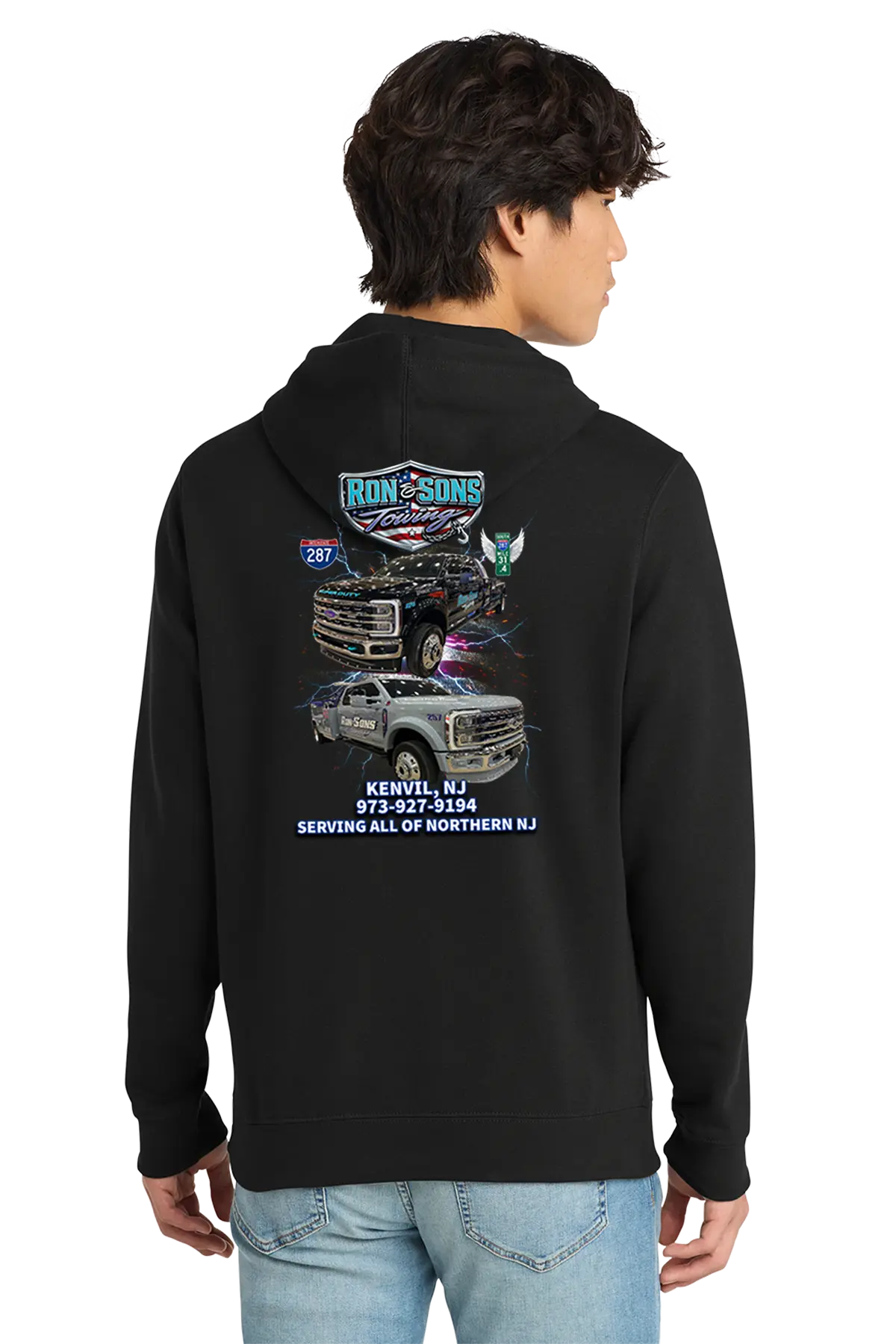 Person wearing a black hoodie with Iron Sides logo and truck graphics on the back. Ron and Sons Towing, Paper Street Print Co, Blairstown, NJ.