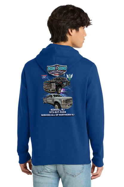 Person wearing a blue hoodie with Iron & Sons logo and truck graphics on the back. Ron and Sons Towing, Paper Street Print Co, Blairstown, NJ.