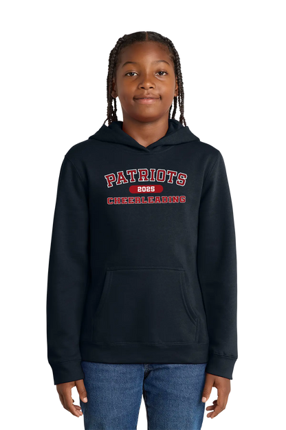 Person wearing a black hoodie with 'Patriots 2023 Cheerleading' text on a white background. Paper Street Print Co, Blairstown, NJ.
