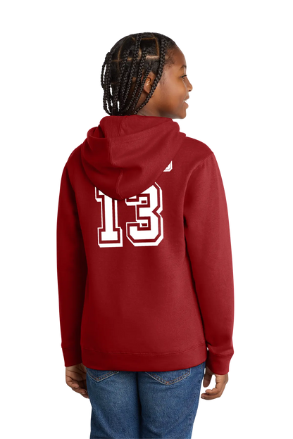 Person wearing a red hoodie with the number 13 on the back, standing against a white background. Paper Street Print Co, Blairstown, NJ.