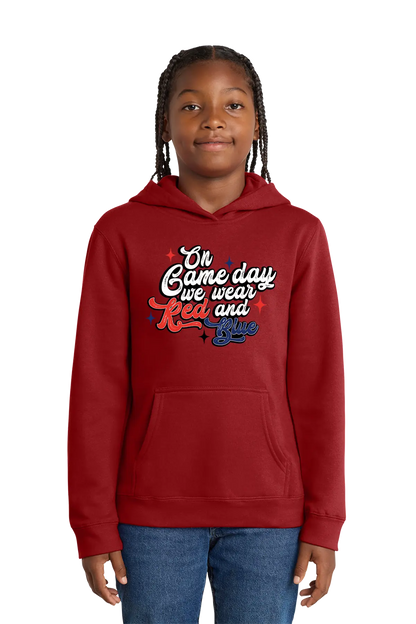 Red hoodie with text worn by a person on a white background. Paper Street Print Co, Blairstown, NJ.