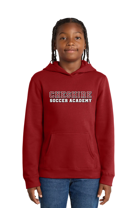 Child wearing a red hoodie with 'Cheshire Soccer Academy' text on a white background. Paper Street Print Co, Blairstown, NJ.