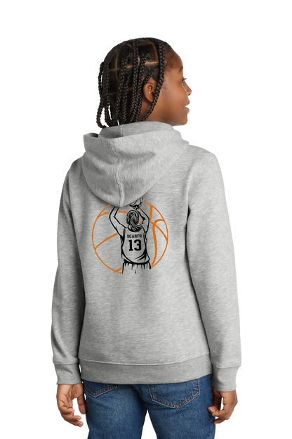 Person wearing a gray hoodie with a basketball design on the back, standing against a white background. Paper Street Print Co, Blairstown, NJ.