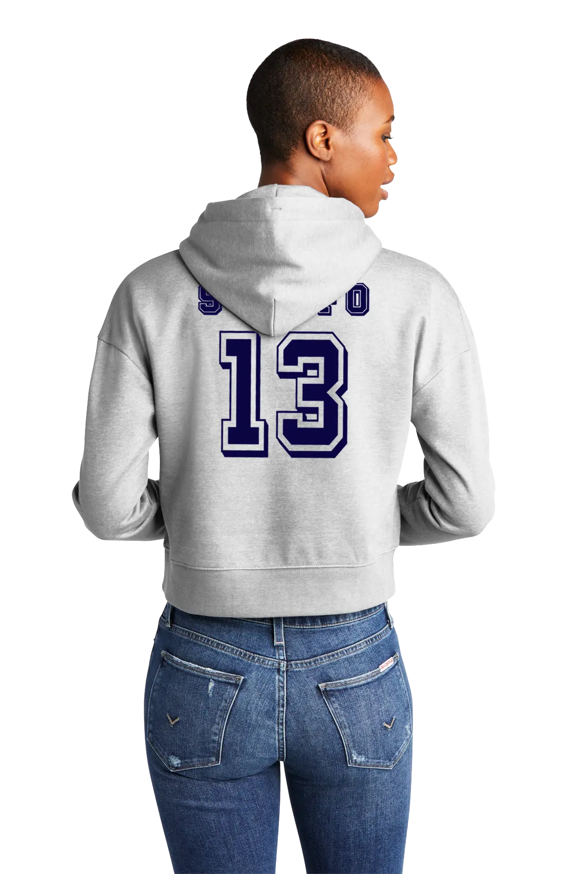 Person wearing a gray hoodie with a number 13 on the back, standing against a white background. Paper Street Print Co, Blairstown, NJ.