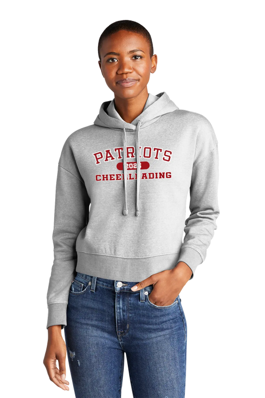 Person wearing a gray hoodie with 'Patriots Cheerleading' text on a white background. Paper Street Print Co, Blairstown, NJ. 