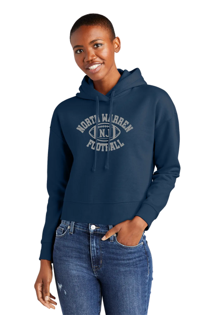 Person wearing a navy blue hoodie with 'North Warren Football' text on a white background. Paper Street Print Co, Blairstown, NJ.