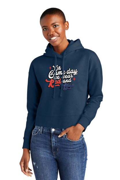 Person wearing a navy hoodie with text and jeans on a white background. Paper Street Print Co, Blairstown, NJ.