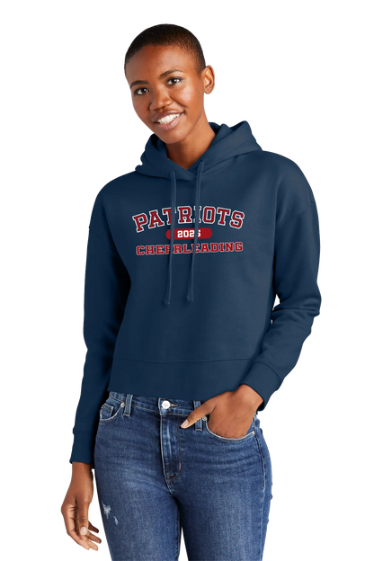 Person wearing a navy hoodie with 'Patriots' text on a white background. Paper Street Print Co, Blairstown, NJ. 
