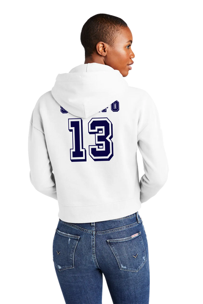 Person wearing a white hoodie with blue text and numbers on the back, standing against a white background. Paper Street Print Co, Blairstown, NJ. 