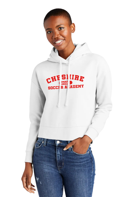 Person wearing a white hoodie with red text and blue jeans on a white background. Paper Street Print Co, Blairstown, NJ.