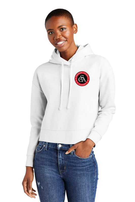 Woman wearing a white hoodie with a logo on a white background. Paper Street Print Co, Blairstown, NJ.