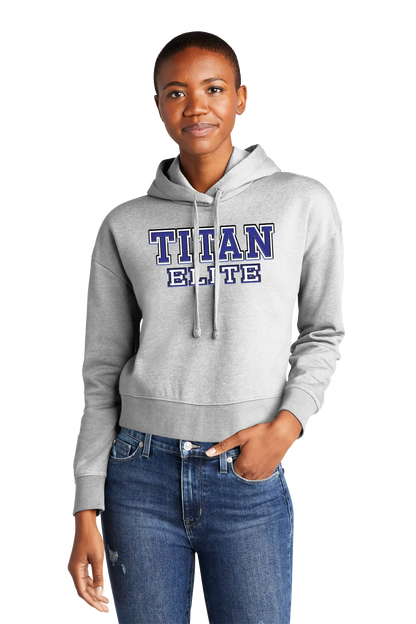Person wearing a gray hoodie with 'TITAN ELITE' text on a white background. Paper Street Print Co, Blairstown, NJ.