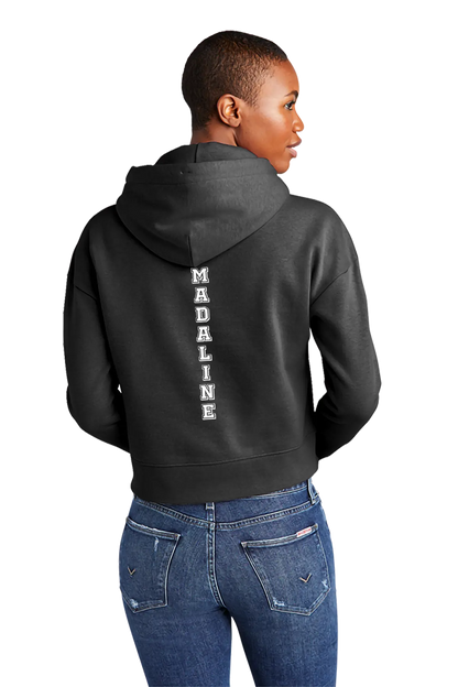 Person wearing a black hoodie with 'MADELINE' printed on the back, standing against a white background. Paper Street Print Co, Blairstown, NJ.