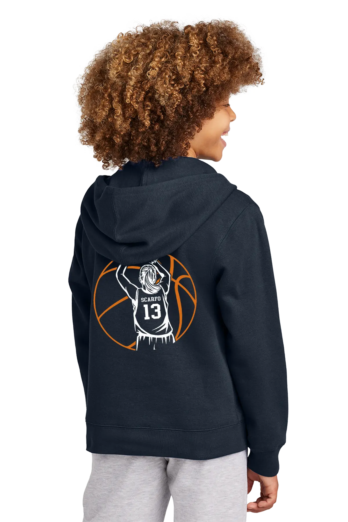 Person wearing a navy blue hoodie with a basketball design on the back, on a white background. Paper Street Print Co, Blairstown, NJ.