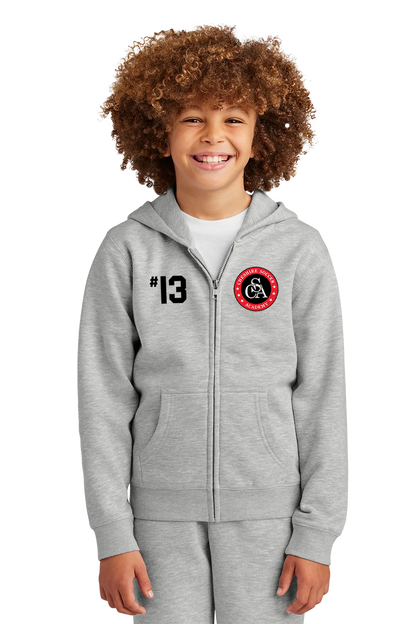 Child wearing a gray hoodie with a logo and number on a white background. Paper Street Print Co, Blairstown, NJ.