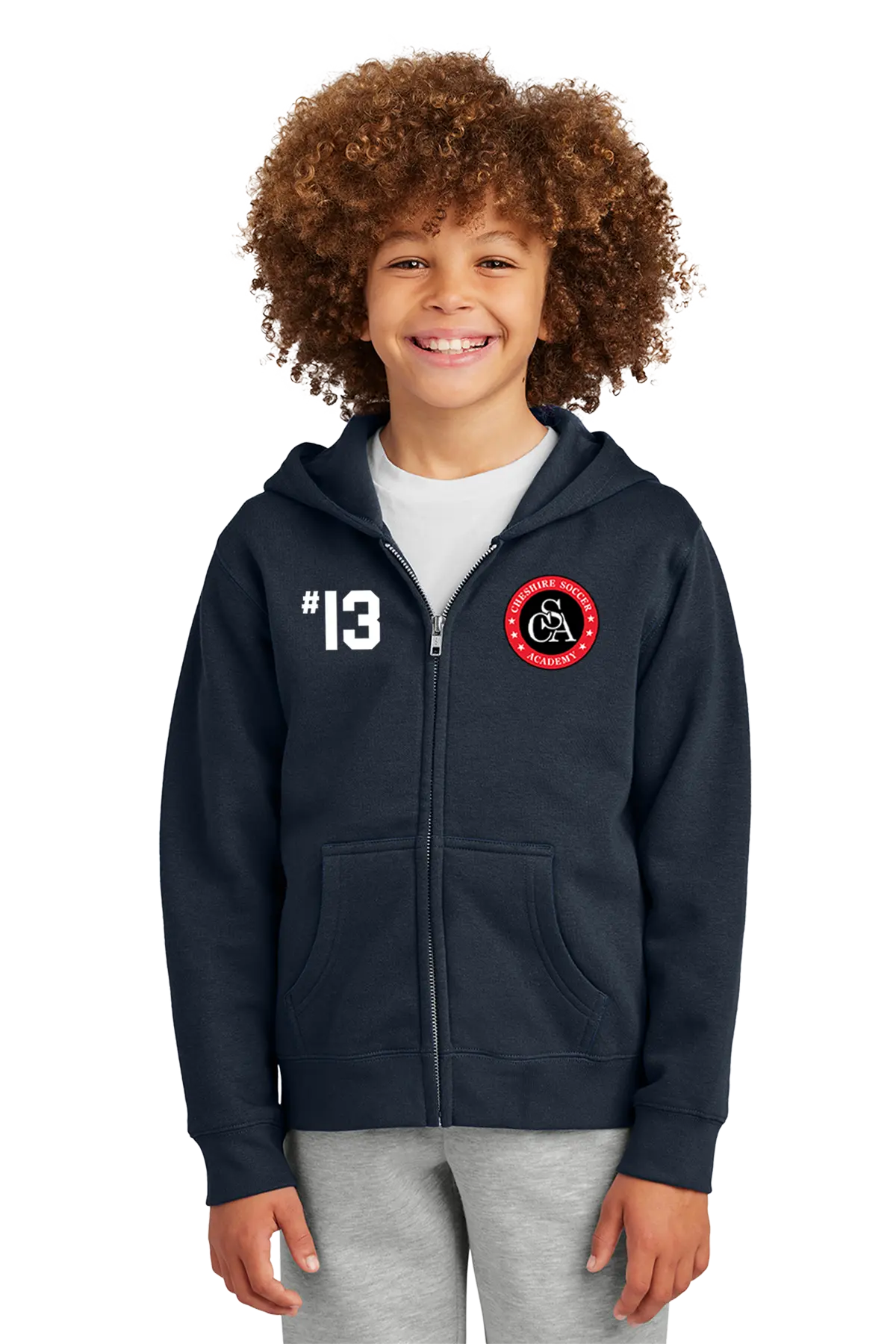 Child wearing a navy blue hoodie with a logo and number on a white background. Paper Street Print Co, Blairstown, NJ.