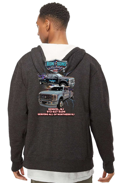 Person wearing a dark hoodie with truck graphics and text on the back, on a white background. Ron and Sons Towing, Paper Street Print Co, Blairstown, NJ.