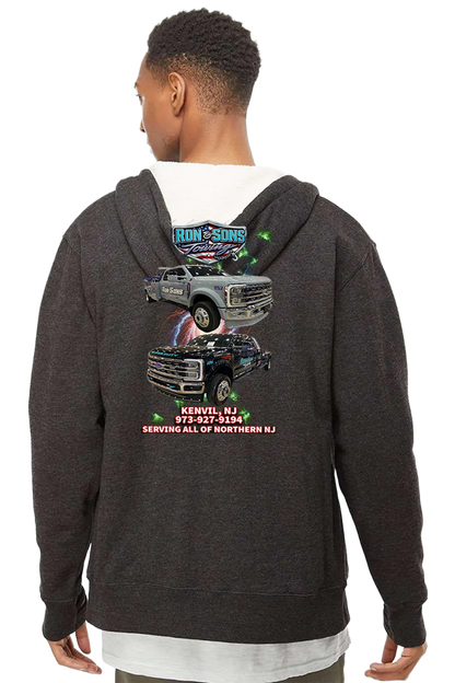 Person wearing a dark gray hoodie with truck graphics and text on the back, on a white background. Ron and Sons Towing, Paper Street Print Co, Blairstown, NJ.