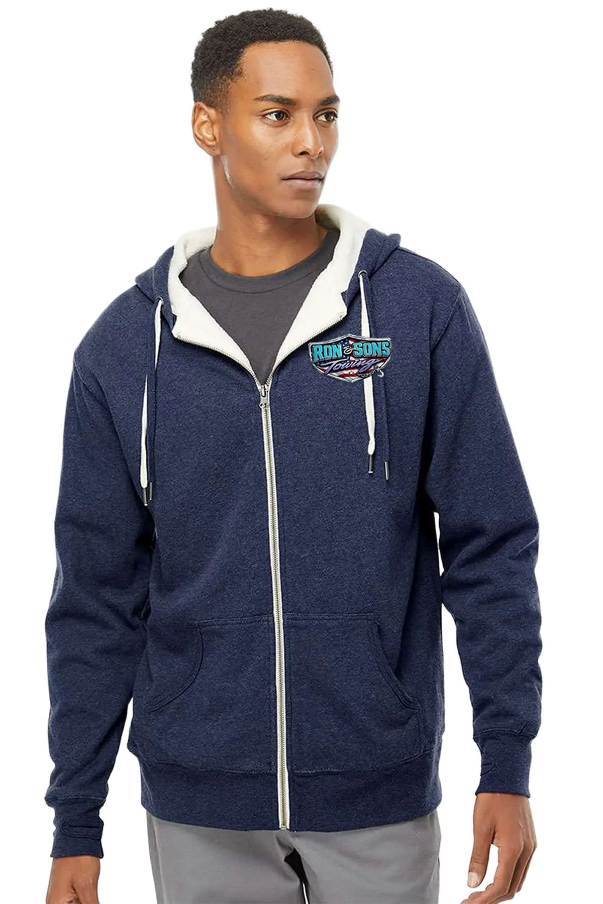 Man wearing a navy blue hoodie with a logo on a white background. Ron and Sons Towing, Paper Street Print Co, Blairstown, NJ.