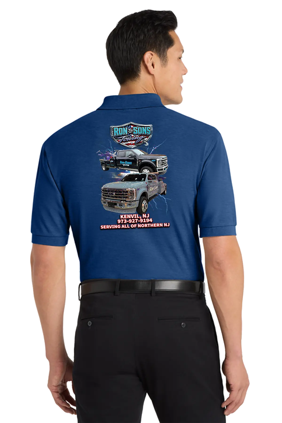 Man wearing a blue shirt with truck graphics and text on the back. Ron and Sons Towing, Paper Street Print Co, Blairstown, NJ.