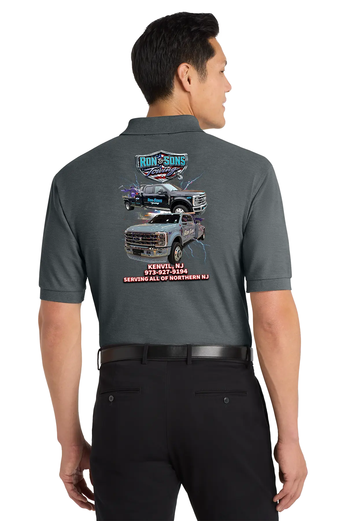 Person wearing a gray polo shirt with vehicle graphics and text on the back. Ron and Sons Towing, Paper Street Print Co, Blairstown, NJ.
