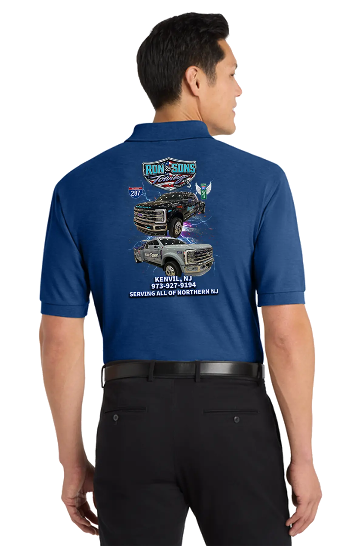 Man wearing a blue shirt with graphics and text on the back, standing against a white background. Ron and Sons Towing, Paper Street Print Co, Blairstown, NJ.