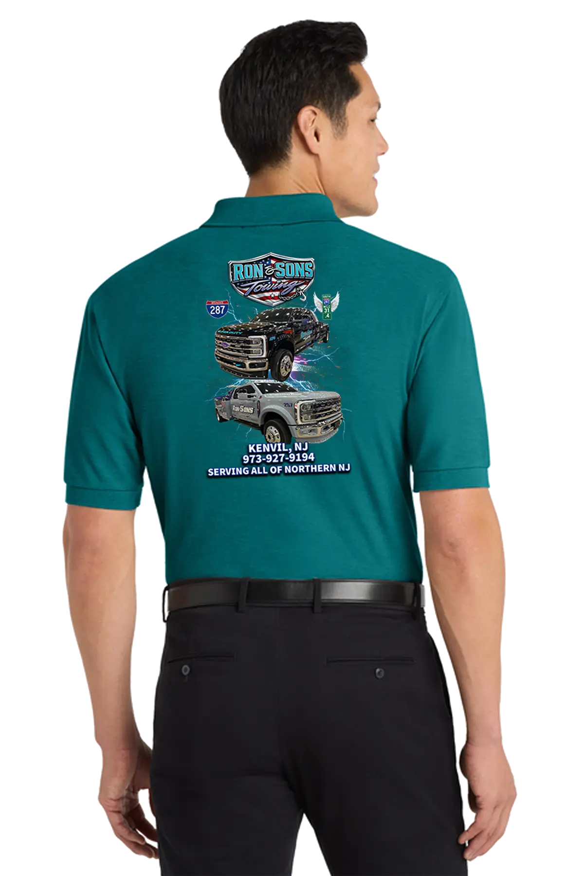 Man wearing a teal shirt with truck graphics and text on the back. Ron and Sons Towing, Paper Street Print Co, Blairstown, NJ.