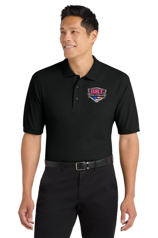 Man wearing a black polo shirt with a logo on a white background. BRT Towing and Recovery, Paper Street Print Co, Blairstown, NJ.