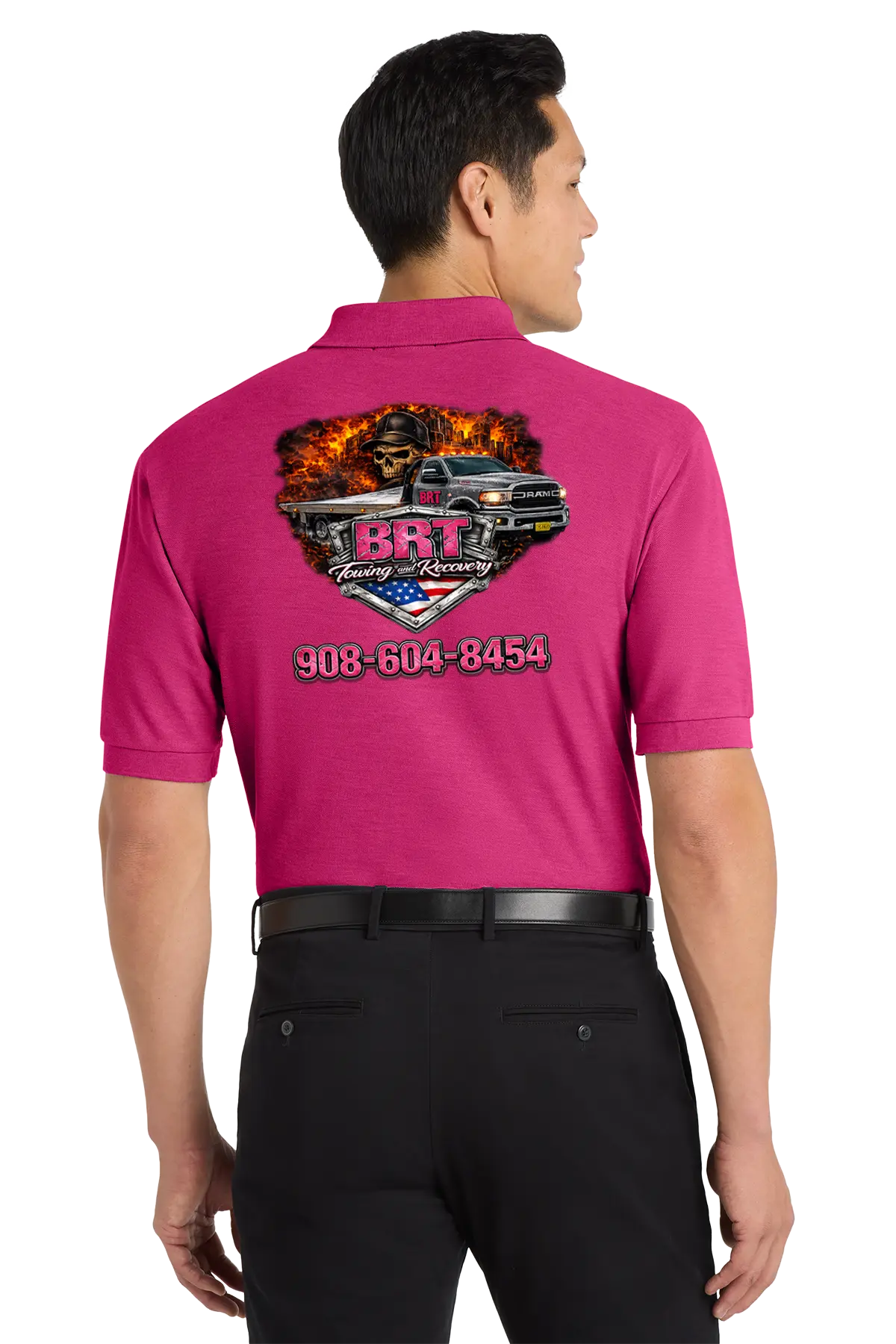 Person wearing a pink shirt with a graphic design on the back, standing against a white background. BRT Towing and Recovery, Paper Street Print Co, Blairstown, NJ.