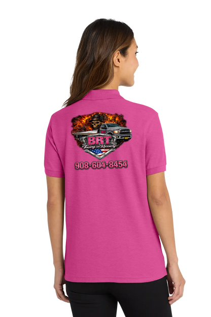 Person wearing a pink polo shirt with a graphic design and contact information on the back. BRT Towing & Recovery, Paper Street Print Co, Blairstown, NJ.