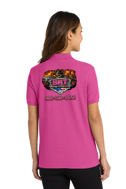 Person wearing a pink polo shirt with a logo and text on the back. BRT Towing & Recovery, Paper Street Print Co, Blairstown, NJ.