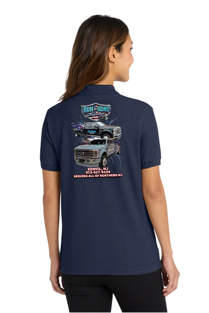 Navy blue polo shirt with graphics on the back worn by a person. Ron and Sons Towing, Paper Street Print Co, Blairstown, NJ.