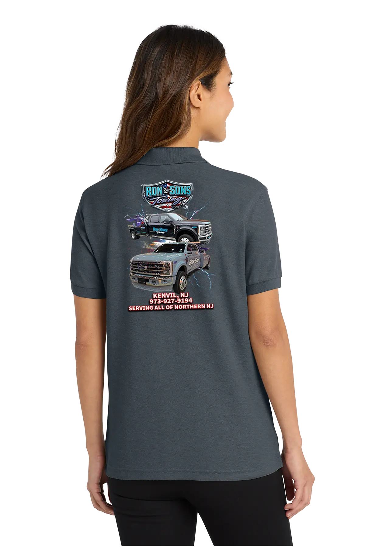 Person wearing a dark gray polo shirt with a graphic on the back, standing against a white background. Ron and Sons Towing, Paper Street Print Co, Blairstown, NJ.