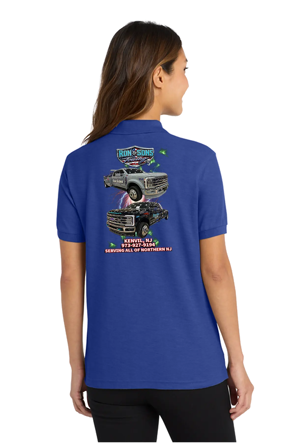 Person wearing a blue polo shirt with a graphic on the back, standing against a white background. Ron and Sons Towing, Paper Street Print Co, Blairstown, NJ.