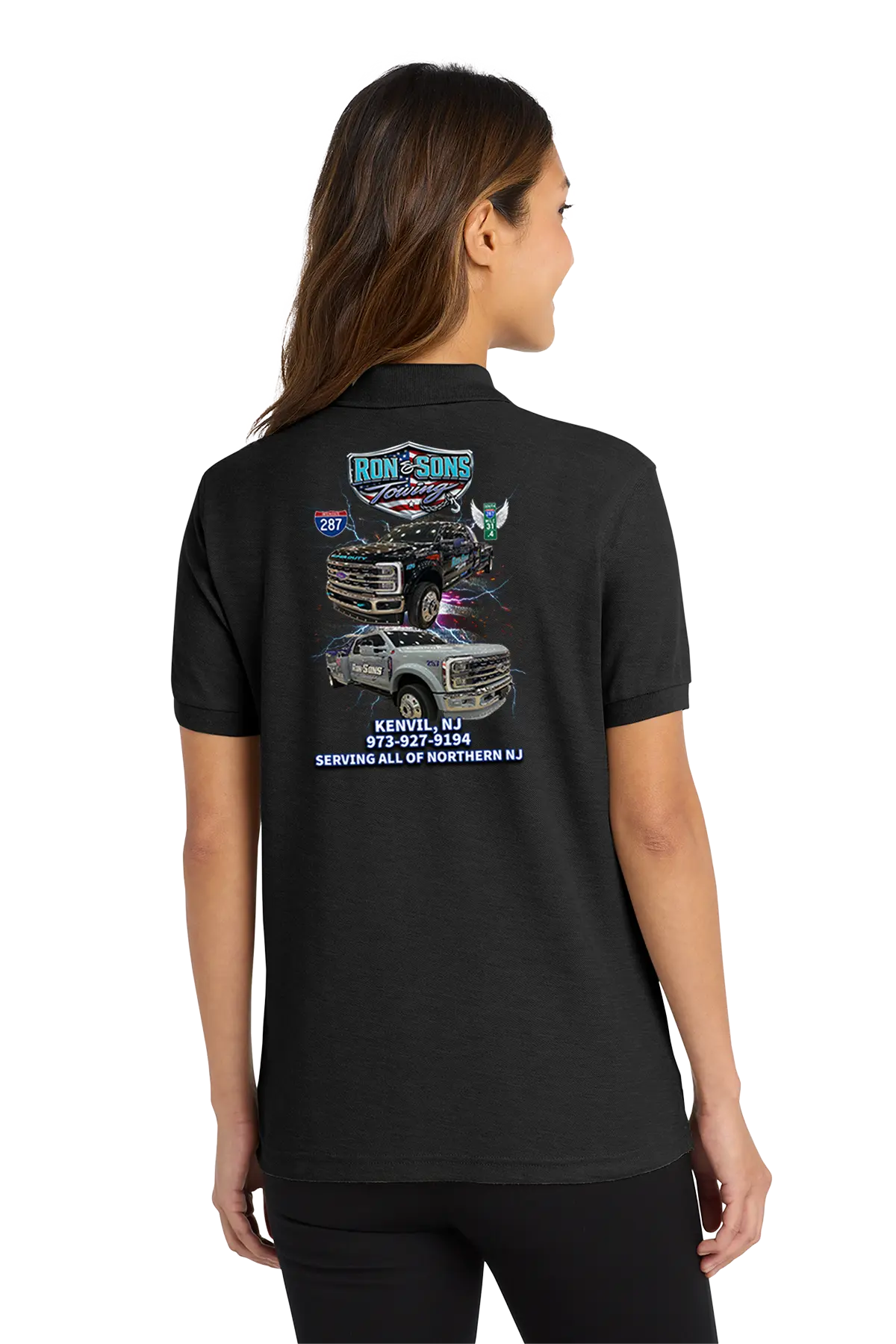Black polo shirt with graphics and text on the back, worn by a person. Ron and Sons Towing, Paper Street Print Co, Blairstown, NJ.