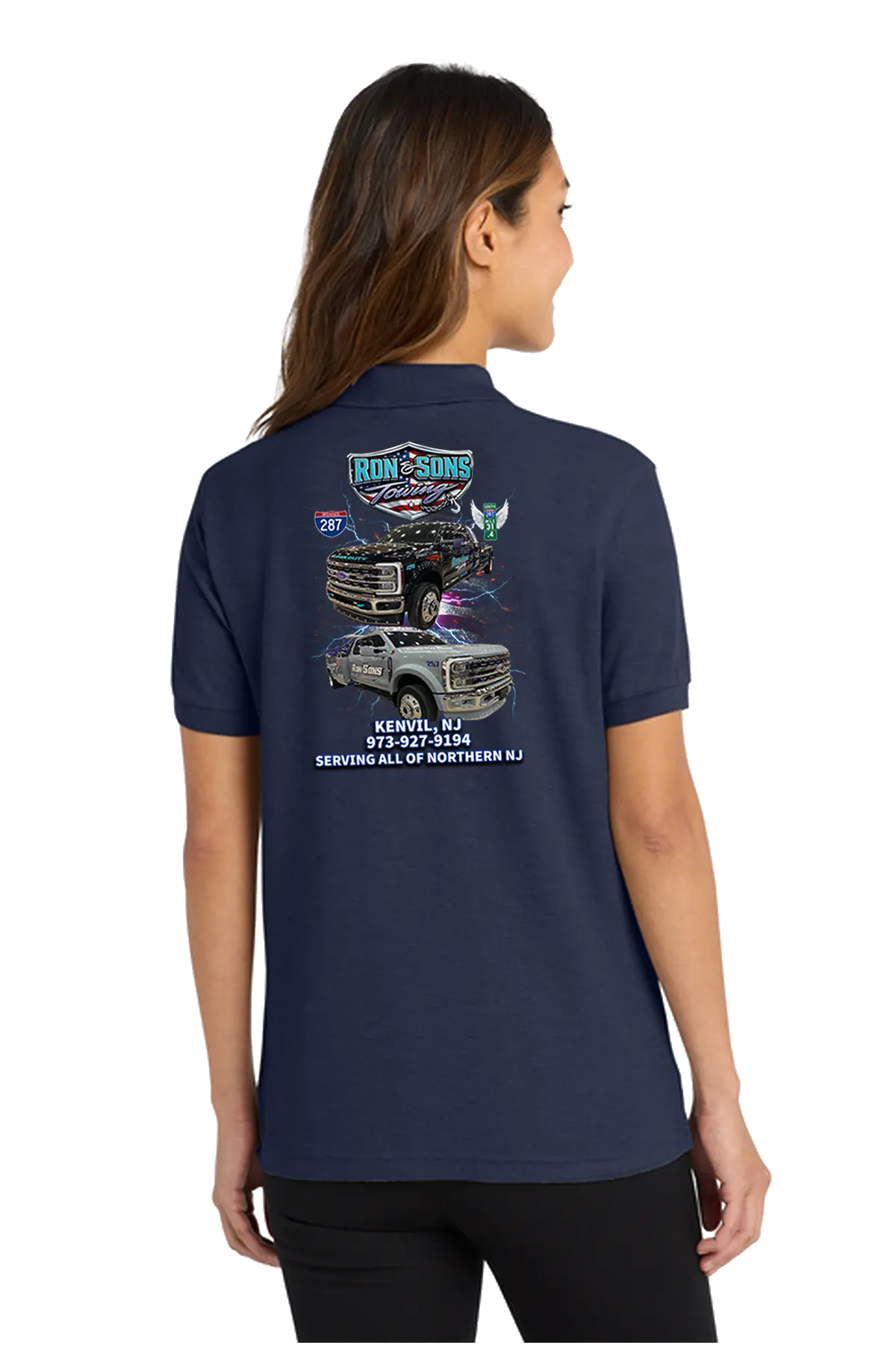 Person wearing a navy blue polo shirt with graphics on the back. Ron and Sons Towing, Paper Street Print Co, Blairstown, NJ.