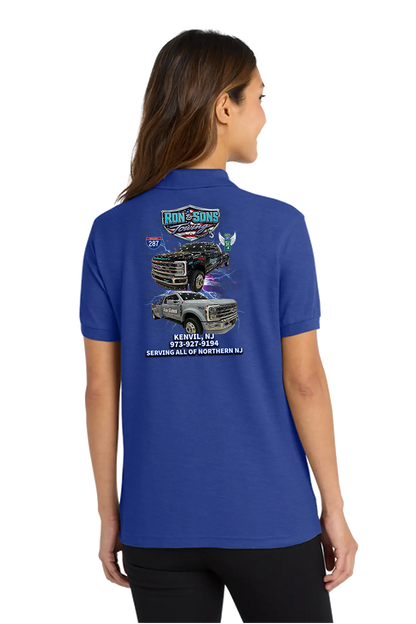 Person wearing a blue shirt with graphics on the back, standing against a white background. Ron and Sons Towing, Paper Street Print Co, Blairstown, NJ.