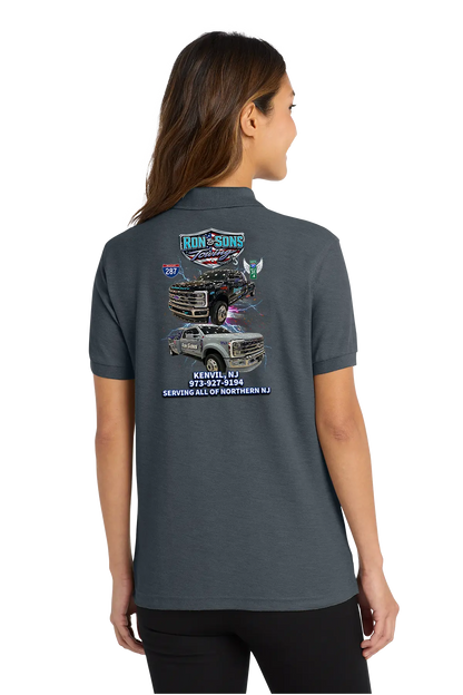 Person wearing a dark gray polo shirt with a graphic on the back, standing against a white background. Ron and Sons Towing, Paper Street Print Co, Blairstown, NJ.