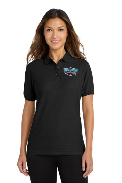 Woman wearing a black polo shirt with a logo on a white background. Ron and Sons Towing, Paper Street Print Co, Blairstown, NJ.