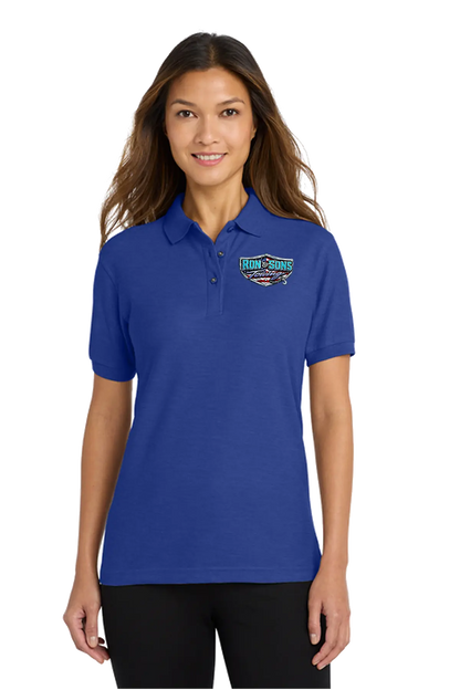 Woman wearing a blue polo shirt with a logo on a white background. Ron and Sons Towing, Paper Street Print Co, Blairstown, NJ.