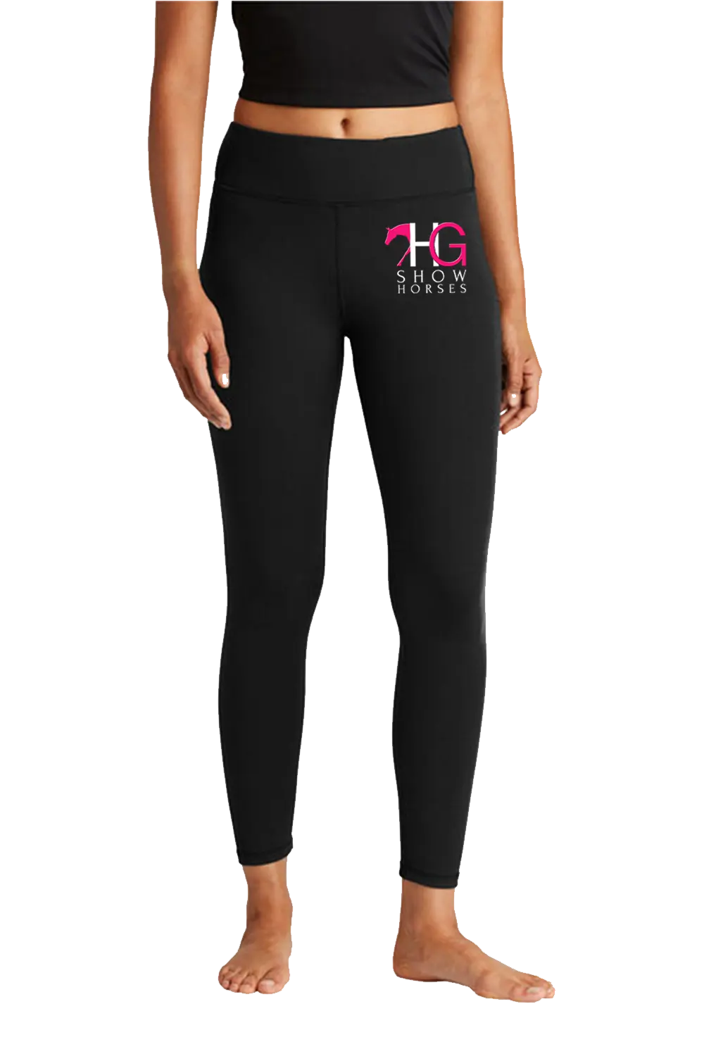 Black high-waisted leggings with a pink and white 'HG Show Horses' logo on the left thigh, modeled on a person against a white background. HG Show Horses, Paper Street Print Co, Blairstown, NJ.