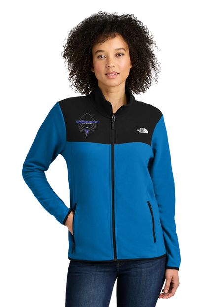 Woman wearing a blue and black jacket with a logo on a white background. Titan Elite Cheerleading, Paper Street Print Co, Blairstown, NJ.