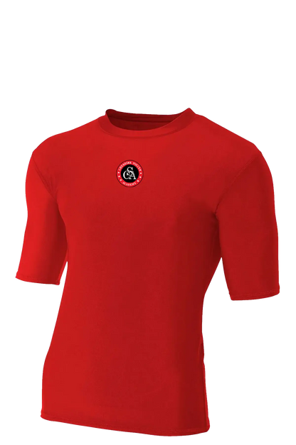 Red t-shirt with a logo on the chest against a white background. Cheshire Soccer Academy. Paper Street Print Co, Blairstown, NJ.