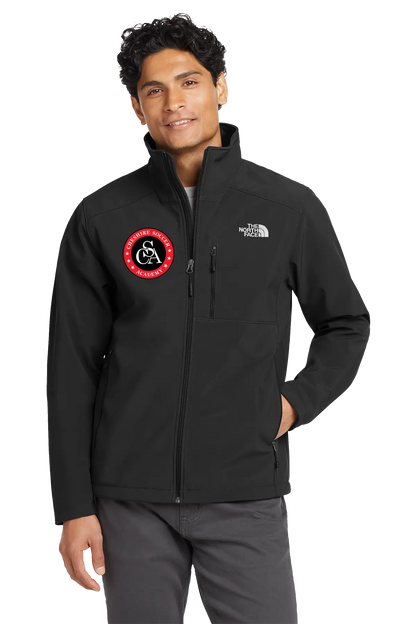 Person wearing a black jacket with a logo on a white background. Paper Street Print Co, Blairstown, NJ.