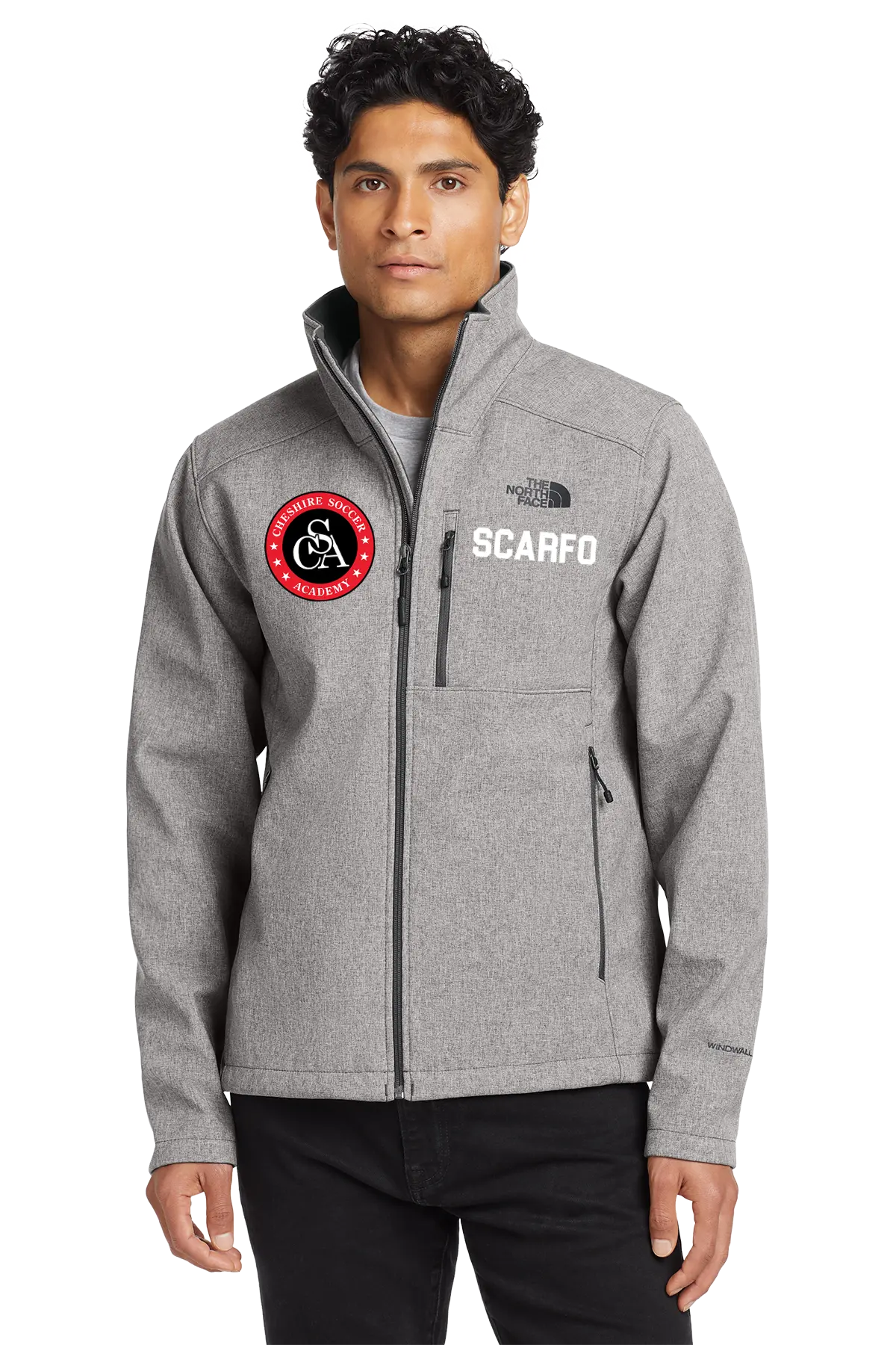 Man wearing a gray jacket with logos on a white background. Paper Street Print Co, Blairstown, NJ.
