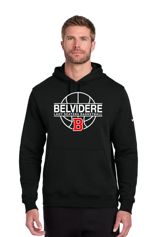 A man wearing a black pullover hoodie with a white and red 'Belvidere Lady Seaters Basketball' graphic on the chest, featuring a red 'B' logo. A small white Nike swoosh is visible on the right sleeve. Paper Street Print Co, Blairstown, NJ.