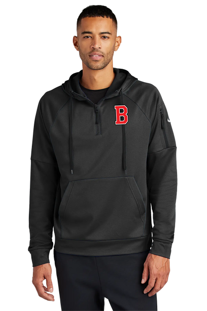 A man wearing a black pullover hoodie with a red Boston 'B' logo on the chest, photographed against a plain white background. Belvidere Lady Seaters Basketball, Paper Street Print Co, Blairstown, NJ.